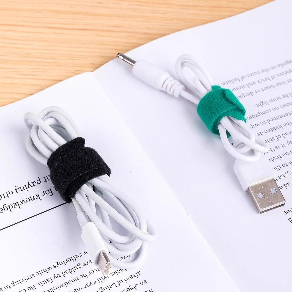 Storage wire manager, winding hub, data cable, cable management, coiled wire harness, cable tie, self-adhesive velcro