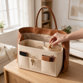 A felt organizer insert inside an open tote bag